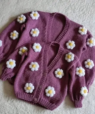 Zapatilla tejida a mano para bebé