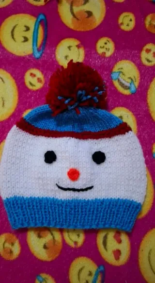 Zapatilla tejida a mano para bebé