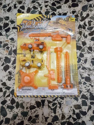 Juguete de grúa y máquinas de construcción de obra