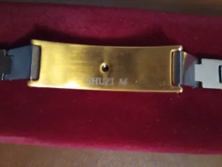 Pulsera de eslabones dorada y plateada