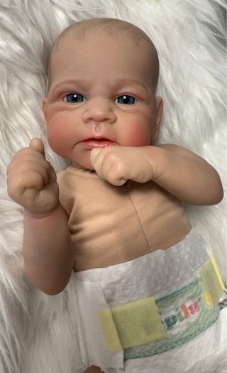 Bebé Reborn + chupetero y mordedor