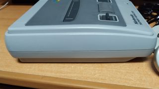 Super Famicom con 2 mandos y juego