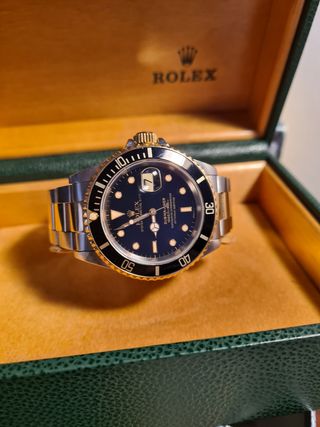 Rolex submariner acero y oro