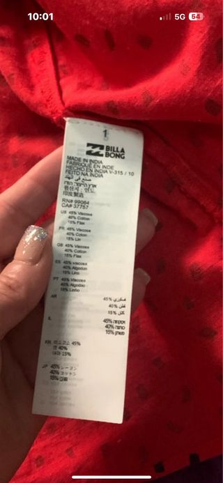 Blusa Billabong roja con lunares negros