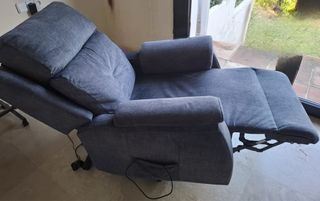 Sillón reclinable gris tela