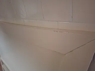 Cabezal de cama de madera beige