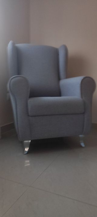 Sillón de tela gris como nuevo