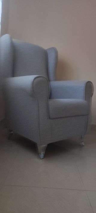 Sillón de tela gris como nuevo
