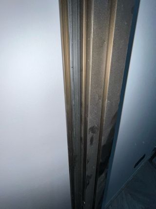 Puerta aluminio color cobre