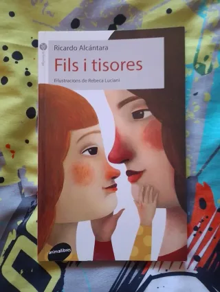 Fils i tisores