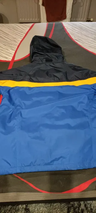 Anorak Joluvi impermeable azul y amarillo