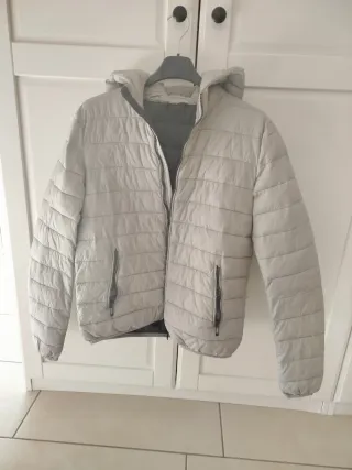 Piumino uomo grigio