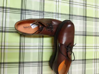 Zapatos de Piel color marrón.