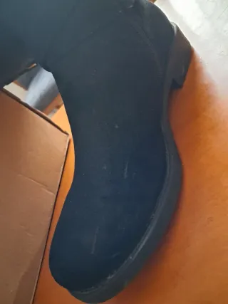 Botas altas negras con hebilla