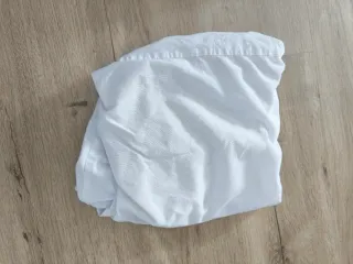 Protector cuna y conjuntos de sábanas y saco