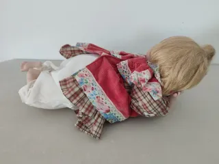 Muñeca porcelana vintage rubia ojos azules