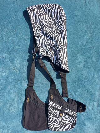 Pistolera con capucha y bolsillos