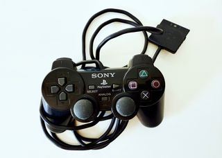 PlayStation 2 SCPH-50004 + Giochi