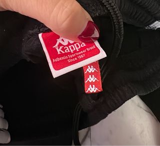 Pantaloni Kappa neri con banda laterale