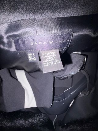 Abrigo negro con detalles de pelo