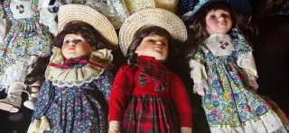 Lotto 7 bambole ceramica