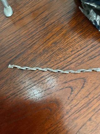 Pulsera con certificación de autenticidad grabada