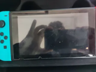 Nintendo Switch + Estuche + Pokemon