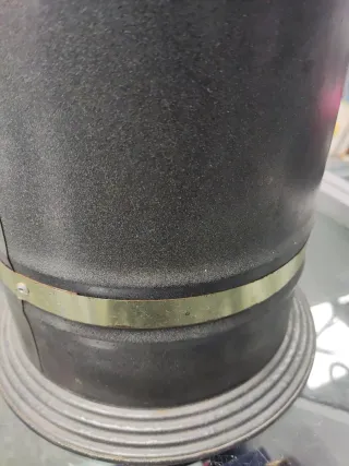 Paragüero de metal negro y dorado