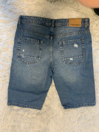 Jeans corti strappati uomo