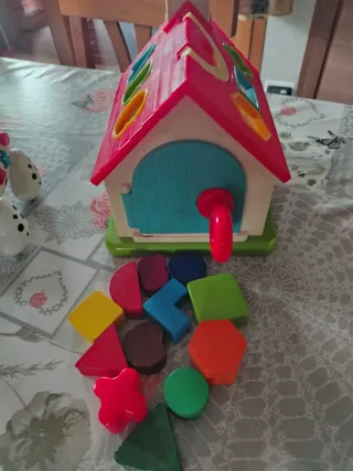 Giochi per bambini: casa, cane e trottola