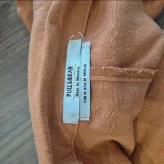 Mono corto naranja Pull&Bear con cinturón