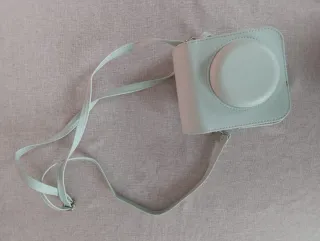 Cámara Instax Mini 12 Turquesa + Funda