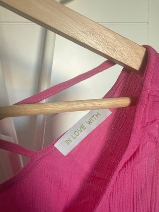 Top rosa tirantes cruzados