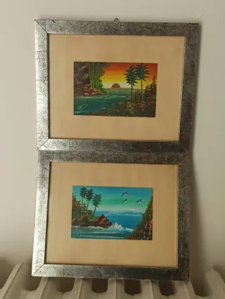 Coppia quadri con cornice argentata