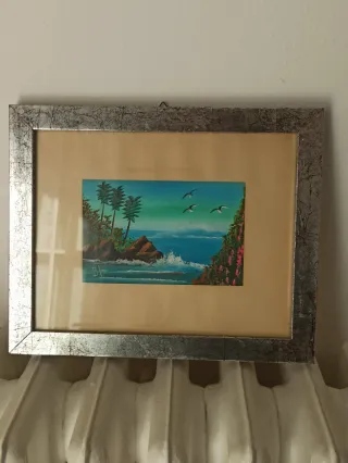 Coppia quadri con cornice argentata