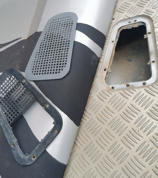 Tapadera Aire Land Rover Defender TD5 rejilla