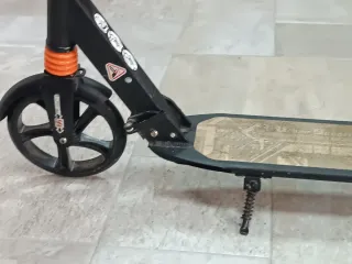 Patinete con amortiguación delantera y trasera