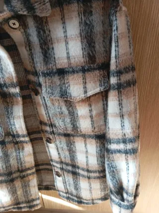 Camisa de cuadros gruesa y cálida.rd más grande de