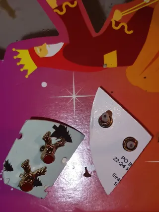 Pendientes de reno y bastones de caramelo