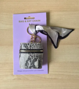 Colgante bolso porta auriculares cremallera