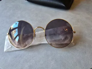 Gafas Ray-Ban Redondas Doradas y Grises