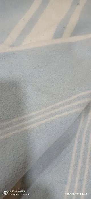 Manta antigua azul y blanca