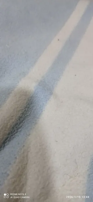 Manta antigua azul y blanca