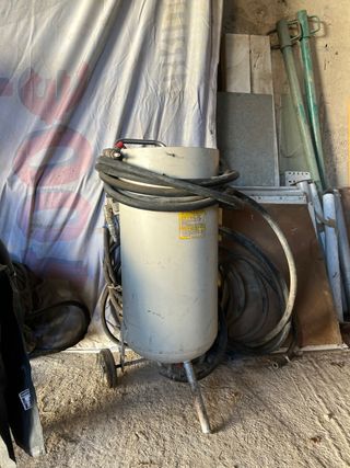 Arenadora con manguera