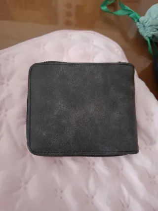 Cartera de mano hombre gris