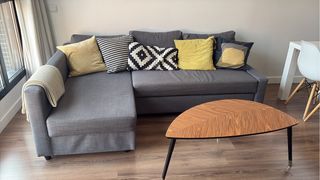 Divano letto chaiselongue con vano portaoggetti grigio