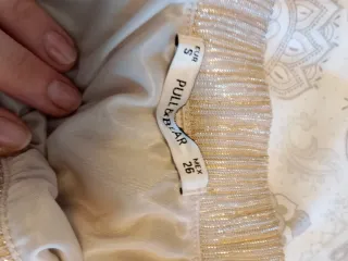 Falda dorada midi brillante talla S