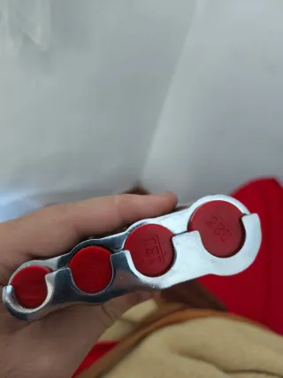 Portamonedas metálico plateado