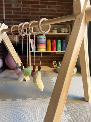 Arco de juegos madera Quax con juguetes