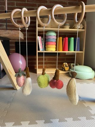 Arco de juegos madera Quax con juguetes